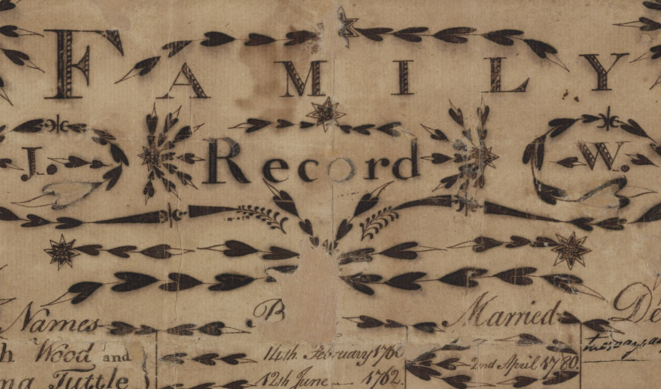 "Family Record" written at the top of an illustrated family record 